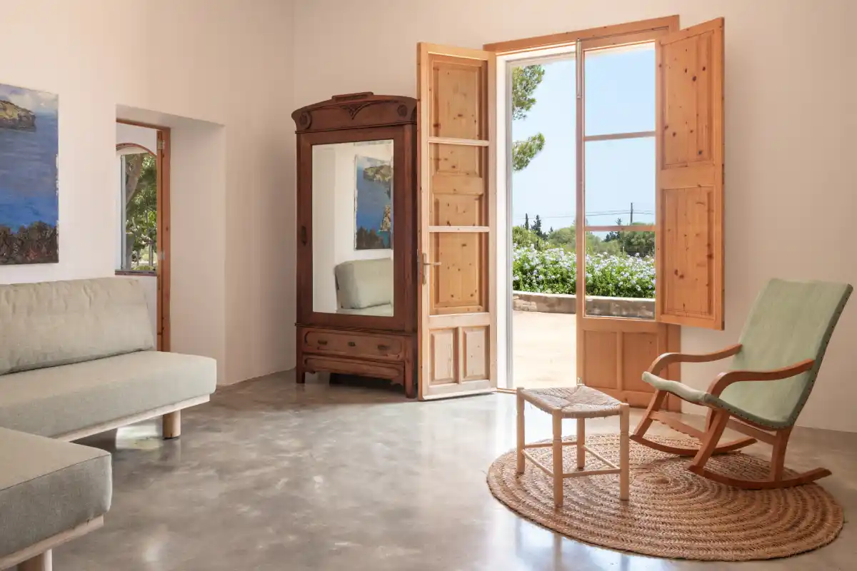 Living room armchair apartment Sa Nau Casa