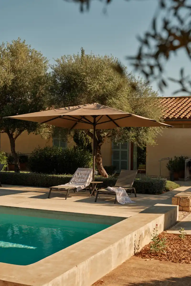 Pool with sun loungers apartment Sa Nau Agroturismo